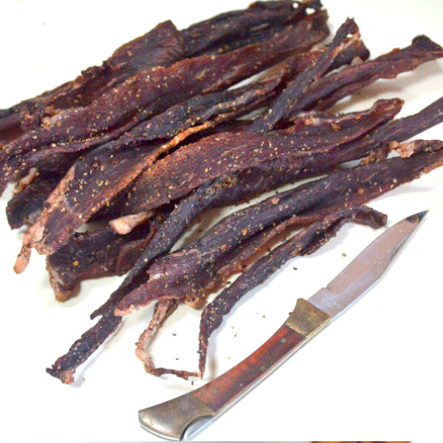 Biltong and Knife 500x EXP photo of biltong and a knife