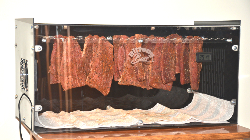 Spicey 820x photo of biltong hanging in Biltong Boss biltong dryer